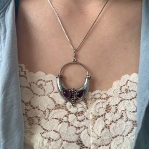 Amethyst pendant with silver detail and chain